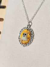 A Golden Haunting Necklace